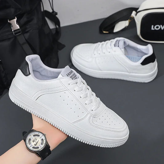 White Casual Shoes Lightweight Sneakers Breathable Tenis Sports Shoes Zapatillas Hombre Leather Men Skateboarding Shoes Flat